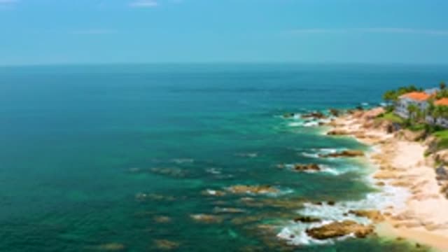 PALMILLA BEACH BCS MEXICO-2020: Aerial Footage Of A Shoreline Beach On The Right