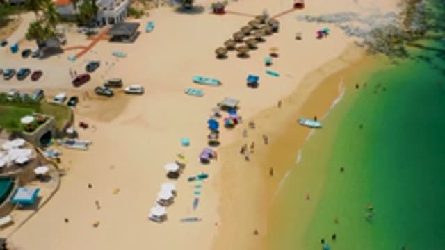 PALMILLA BEACH BCS MEXICO-2020: Seashore With Coloured Beach Umbrellas And Sunbathers