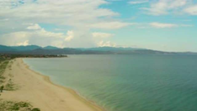LA RIBERA BCS MEXICO-2020: White Clouds Over Long Beach With Soft Sand Waves