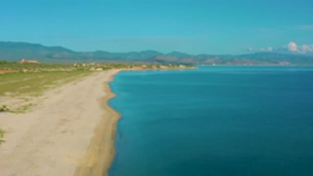 LA RIBERA BCS MEXICO-2020: Drone Flying Above Sandy Beach With Woods In