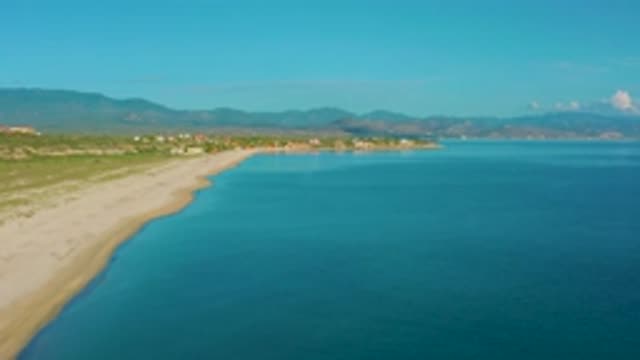LA RIBERA BCS MEXICO-2020: Blue Ocean Water And Sandy Coastline With Mountains