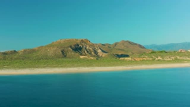 LA RIBERA BCS MEXICO-2020: Blue Clear Sea Water With Mild Waves Mountain Near It