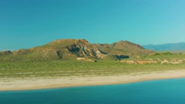 LA RIBERA BCS MEXICO-2020: Blue Sea Water Sand Beach Near Tall Mountain And