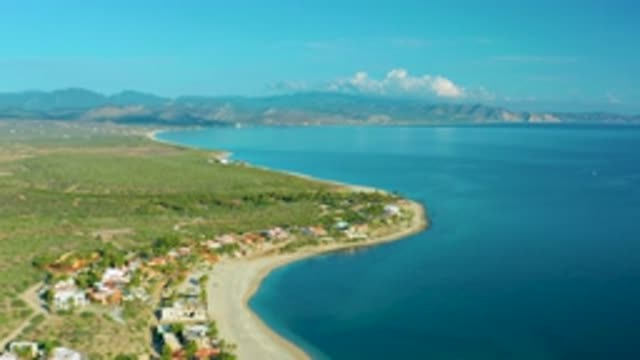 LA RIBERA BCS MEXICO-2020: Coast Land Adorned With Houses Wraps Around Open Blue