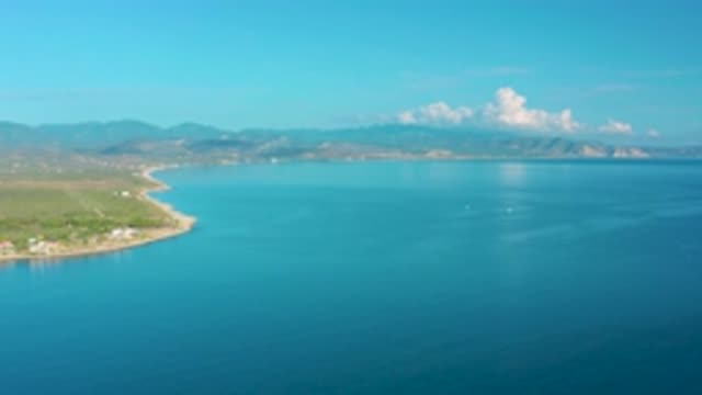 LA RIBERA BCS MEXICO-2020: Distant View Of Land Mountains And Clouds Surrounded