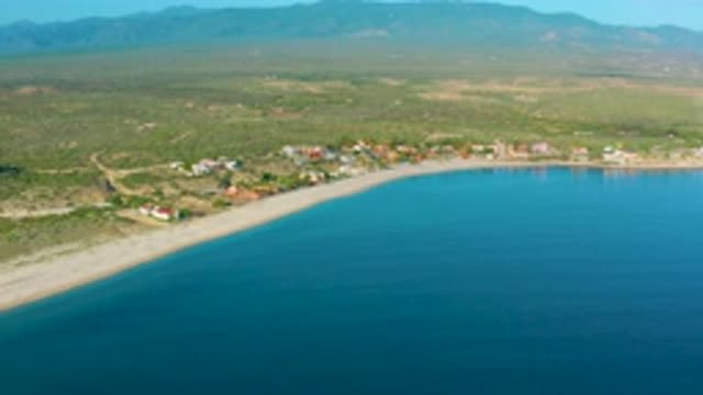 LA RIBERA BCS MEXICO-2020: A Scanning Drone Shot Of A Beautiful Green Coastline