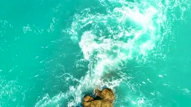 DREAMS BEACH BCS MEXICO-2020: Ocean Waves Around A Cliff