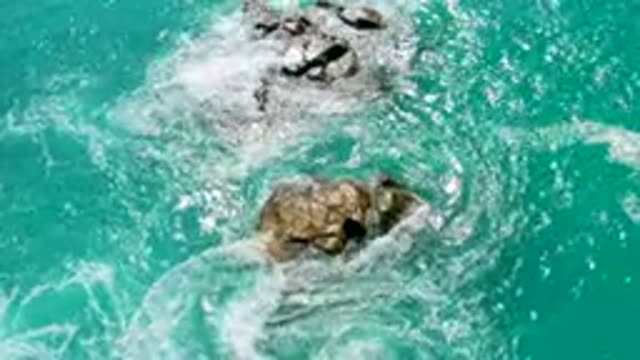 DREAMS BEACH BCS MEXICO-2020: Great Brown Rocks On The Center Of A Sea