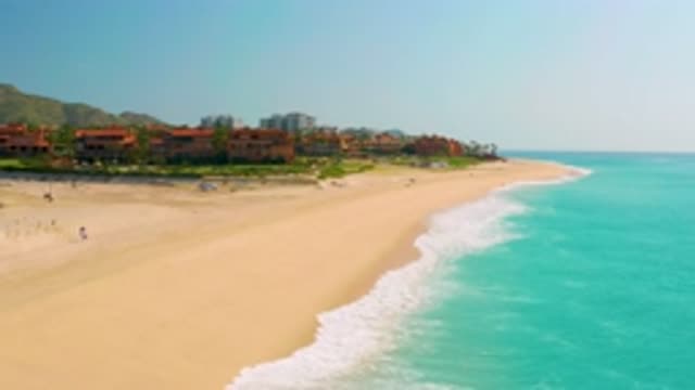 DREAMS BEACH BCS MEXICO-2020: Wide Beach With Blue Sea Parked Car And Building