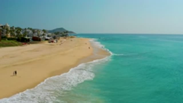 DREAMS BEACH BCS MEXICO-2020: Drone Footage Of Waves Lapping Gently Onto A Sandy Beach