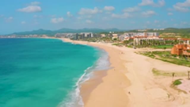 DREAMS BEACH BCS MEXICO-2020: Drone Flying Over A Beach On A Sunny Day With The