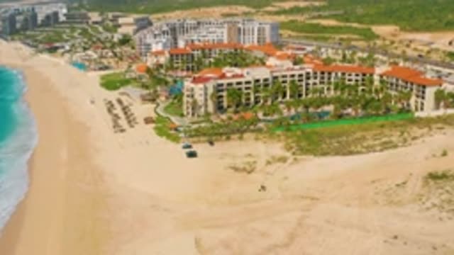 DREAMS BEACH BCS MEXICO-2020: A White And Orange Hotel Resort With A Pool