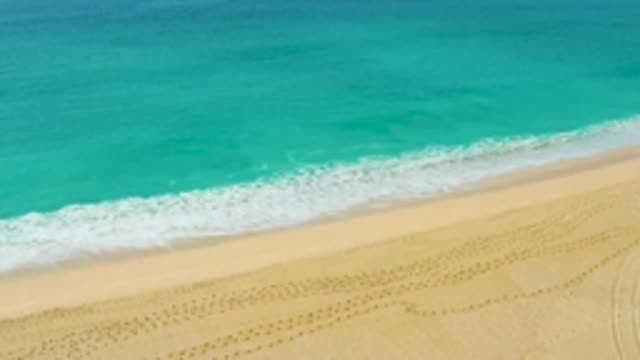 DREAMS BEACH BCS MEXICO-2020: Peaceful Ocean Waves Rolling Onto A Slightly Trodden Sandy Beach