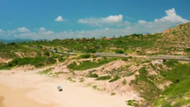 DREAMS BEACH BCS MEXICO-2020: Cars Driving On A Highway Through Hills