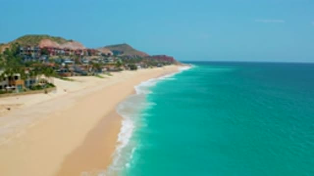DREAMS BEACH BCS MEXICO-2020: Waves Crashing Into The Coast On A Tropical Beach