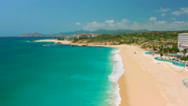 DREAMS BEACH BCS MEXICO-2020: Blue Sea Water With Long Beach Soft Sand Tall Building