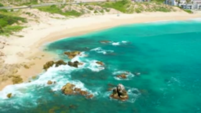 DREAMS BEACH BCS MEXICO-2020: Blue Sea Waves Lashing On A Sandy Shore
