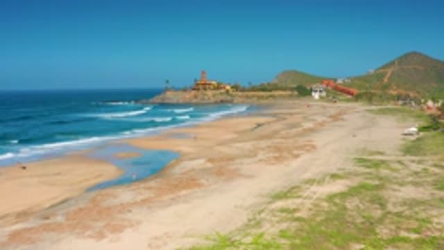 CERRITOS BCS MEXICO-2020: Red Domed Building Sits At Edge Of Sandy Coastline
