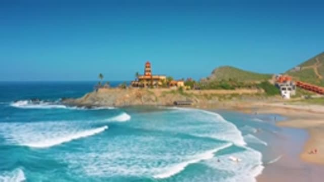 CERRITOS BCS MEXICO-2020: Big Building Green Tall Coconut Trees