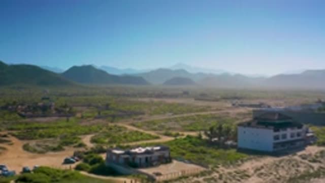 CERRITOS BCS MEXICO-2020: Camera Passing Houses In An Arid Remote And Mountainous Landscape