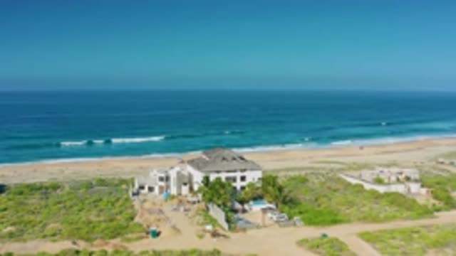 CERRITOS BCS MEXICO-2020: Shot Zooms In On A Large Sand-Colored Mansion On The