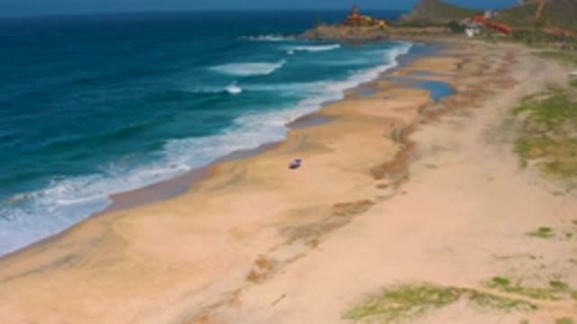 CERRITOS BCS MEXICO-2020: Aerial View Of Waves Hitting Coastal Sand