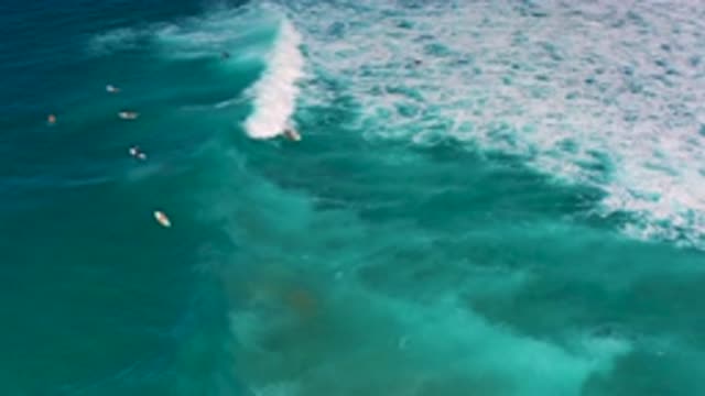 CERRITOS BCS MEXICO-2020: Surfer Rides Board on Crashing White Wave Amidst Open Ocean