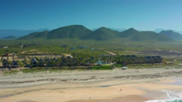 CERRITOS BCS MEXICO-2020: Vast Blue Sky Tall Mountains White Waves Hitting The Beach