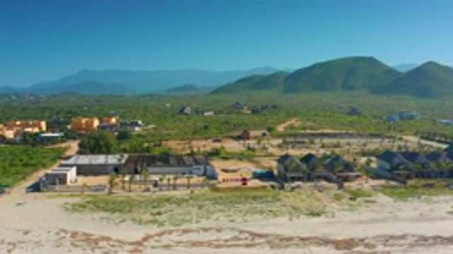 CERRITOS BCS MEXICO-2020: Six Second Flyover Beach Houses Mountain Background