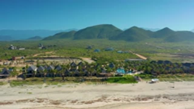 CERRITOS BCS MEXICO-2020: Green Landscape With Houses, Pool, and People Living Peacefully