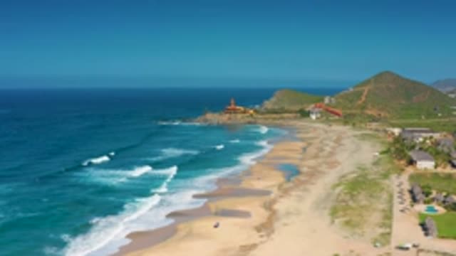 CERRITOS BCS MEXICO-2020: Lighthouse Near An Ocean Coast With Small Houses On