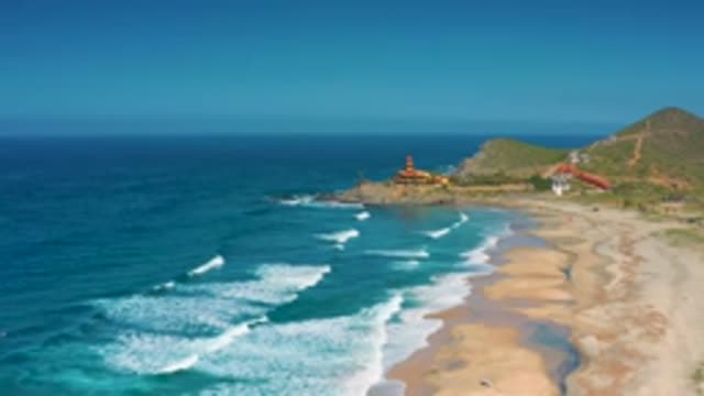 CERRITOS BCS MEXICO-2020: Gentle Ocean Crashing Slowly Onto A Stretch Sandy Beach
