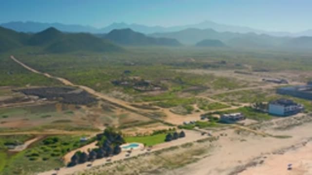 CERRITOS BCS MEXICO-2020: Dusty Aerial Footage Of Small City In Middle Of Half Desert