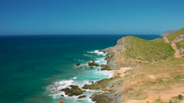 CERRITOS BCS MEXICO-2020: Seaside Shore With Splashy Waves And Hills And Sky