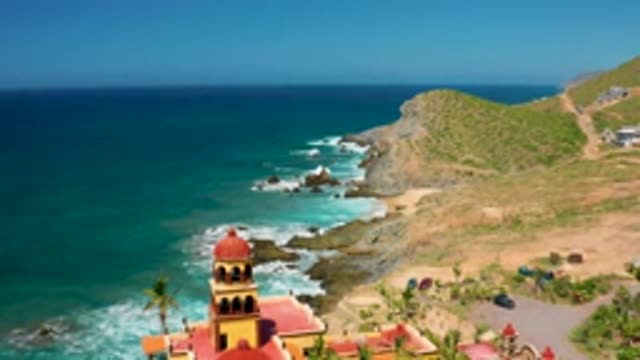 CERRITOS BCS MEXICO-2020: The Shore Of An Island With Tall Red Roofed Buildings