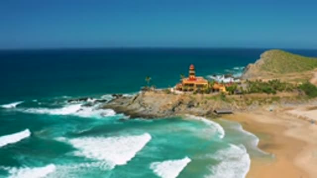 CERRITOS BCS MEXICO-2020: Zoom Out On Tropical Beach Near Colorful Building