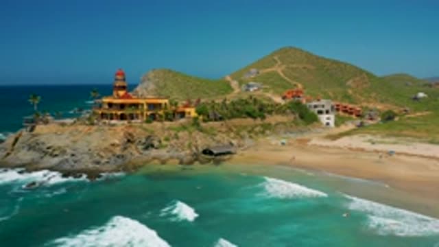 CERRITOS BCS MEXICO-2020: Tall Coconut Trees And White Waves On A Blue Sea