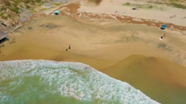 CERRITOS BCS MEXICO-2020: Aerial Footage Angled Down At A Sandy Shoreline With