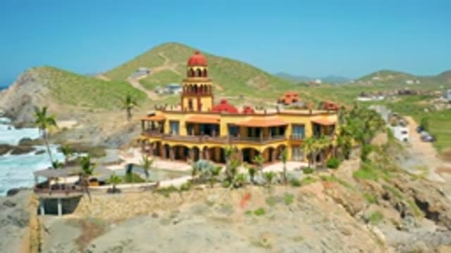 CERRITOS BCS MEXICO-2020: Circling Around Red Domed Building Surrounded By Rocky
