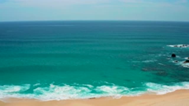 SECRETS MARQUIS LOS CABOS MEXICO-2020: Clear Blue Ocean With Small Crashing Waves