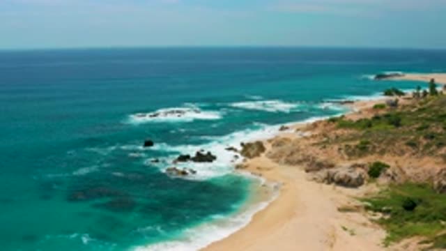 SECRETS MARQUIS LOS CABOS MEXICO-2020: Bird's-Eye View Of A Sandy Beach With Waves