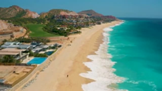 SECRETS MARQUIS LOS CABOS MEXICO-2020: Ocean Waves Crashing Into The Sand On A Tropical Beach