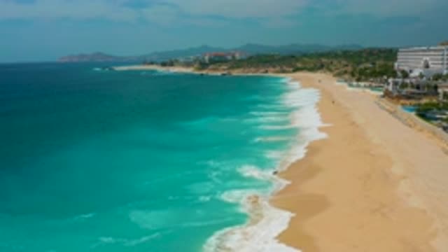 SECRETS MARQUIS LOS CABOS MEXICO-2020: Waves Crashing On A Sandy Beach