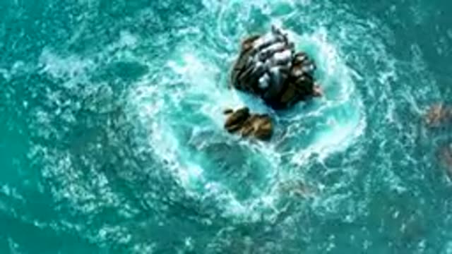 SECRETS MARQUIS LOS CABOS MEXICO-2020: Clear Blue And Green Sea With Large Rock