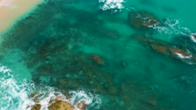 SECRETS MARQUIS LOS CABOS MEXICO-2020: The Blue Ocean Waves Are Splashing Hard Against the Rocks