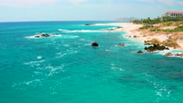 SECRETS MARQUIS LOS CABOS MEXICO-2020: Waves Crashing Into Rocks On The Coast
