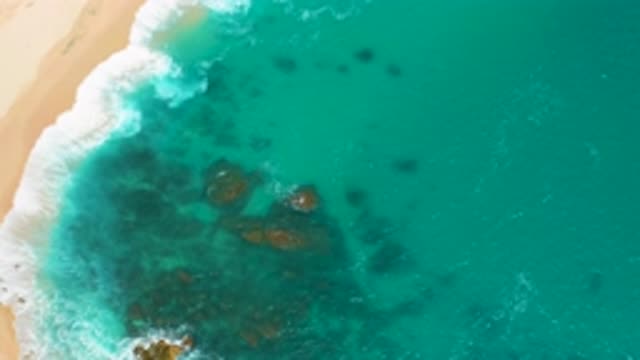 SECRETS MARQUIS LOS CABOS MEXICO-2020: A Beautiful Green Sea Waves Breaking On Shore