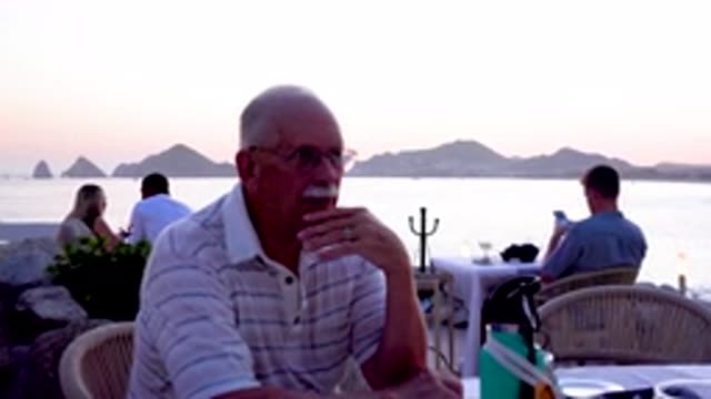CABO SAN LUCAS MEXICO-October 24,2020: An Old Man Eating At A Seaside Restaurant