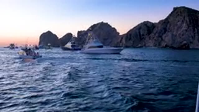 CABO SAN LUCAS MEXICO-2020: Many White Boats Sailing In The Sea And Mountains