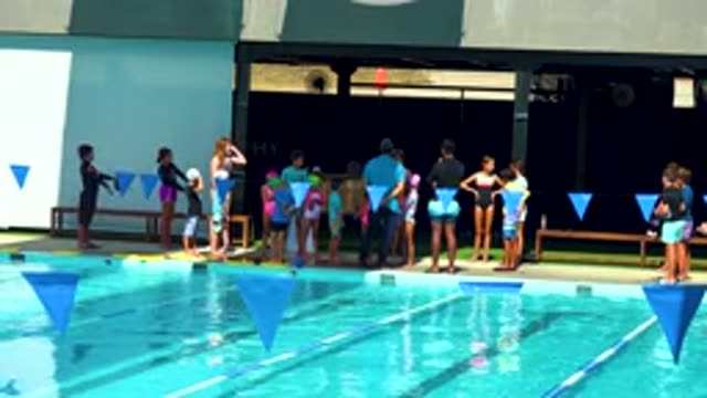 CABO SAN LUCAS MEXICO-2020: Swimmers in Swimsuits Enjoy Public Pool on Hot Summer Day